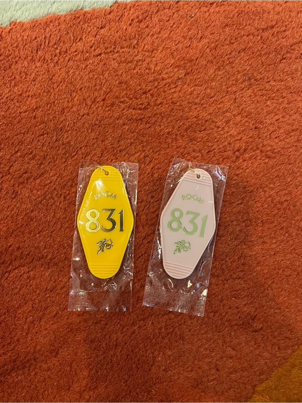 Two 831 Stories Only One Bed Motel keychains NWT